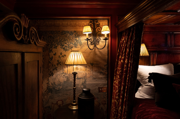 Sumptuous bedroom in a gothic-inspired suite at The Witchery with four poster bed