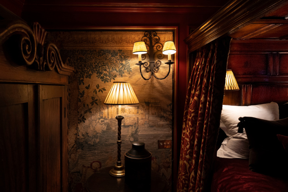 Sumptuous bedroom in a gothic-inspired suite at The Witchery with four poster bed