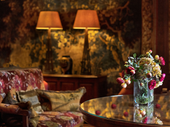 The Turret Suite with Flowers on a Table