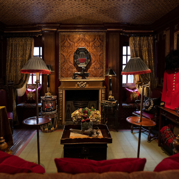 Lavish sitting room in Guardroom Suite at The Witchery with dramatic styling and historic charm