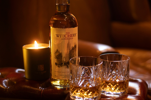 The Witchery Whisky in crystal glasses by the fireplace