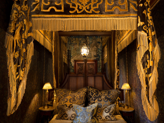 The bed front on in The Heriot Suite in The Witchery