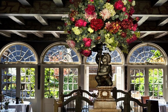 Flower display in The Secret Garden restaurant in Edinburgh looking out onto the terrace