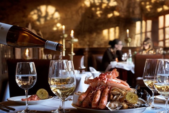 Seafood platter served with white wine at The Witchery
